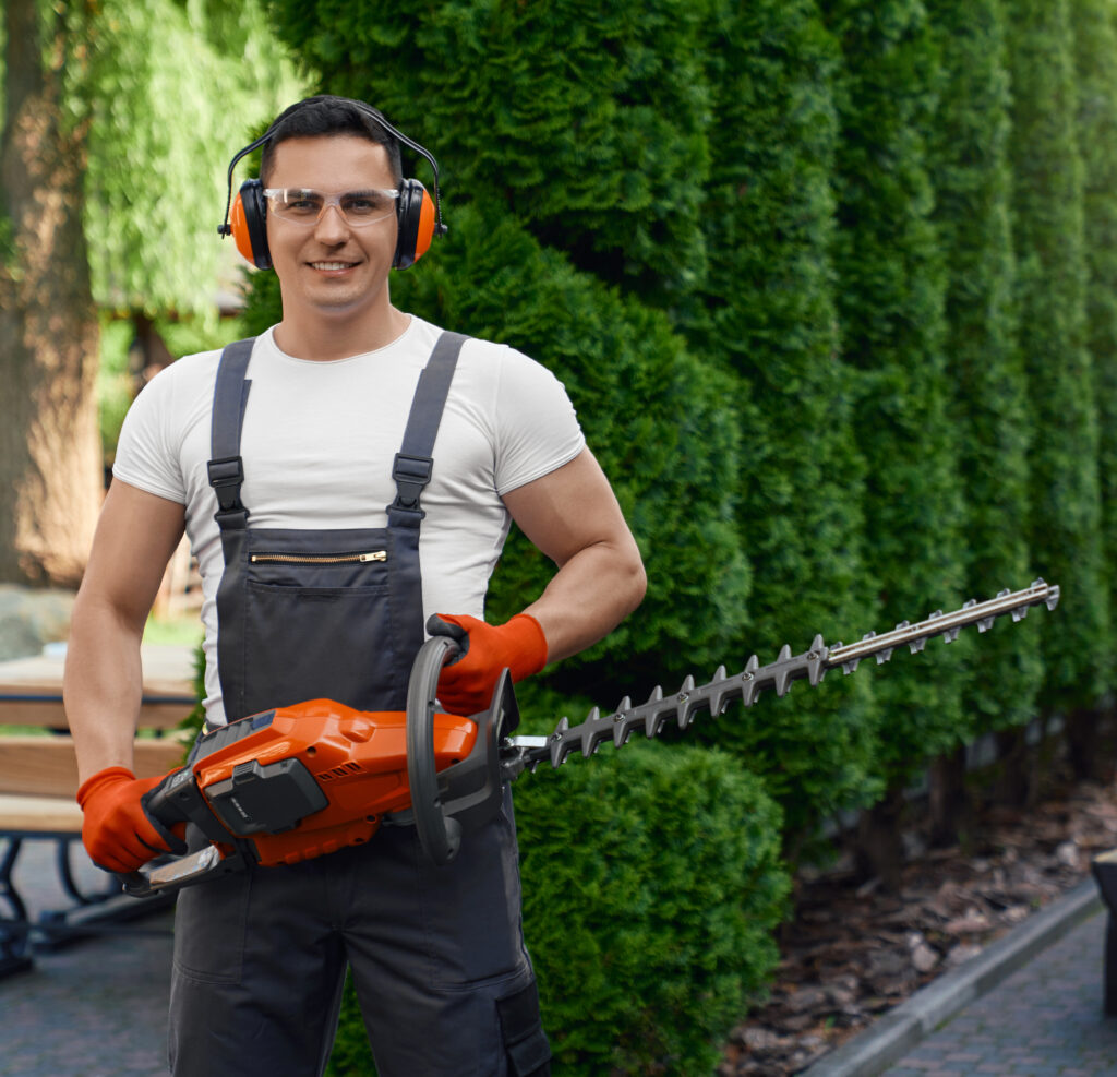 student with yard tools