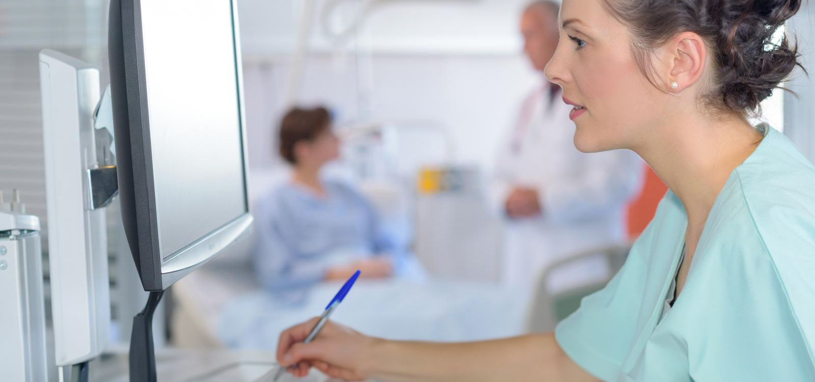 Medical Coding student stares at a computer monitor