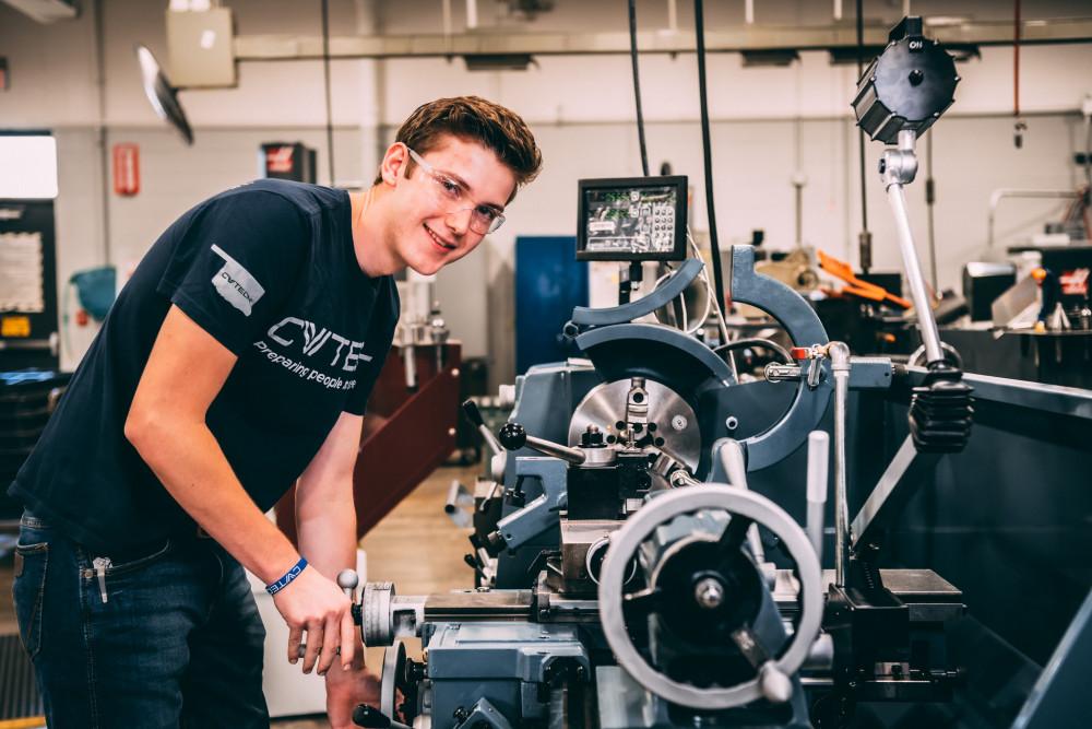 student in precision machining classroom